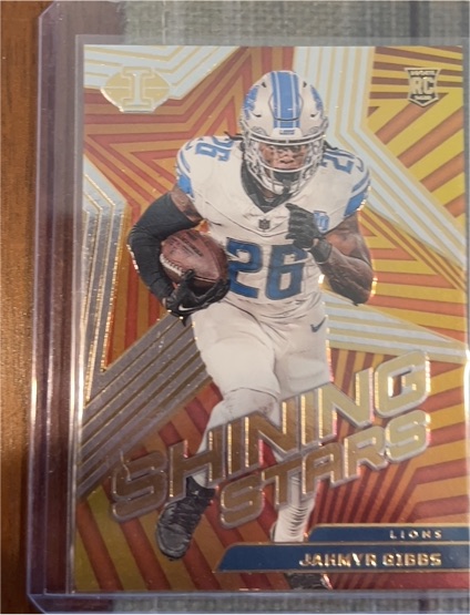 2023 Panini Illusions Shining Stars #20 Jahmyr Gibbs — front