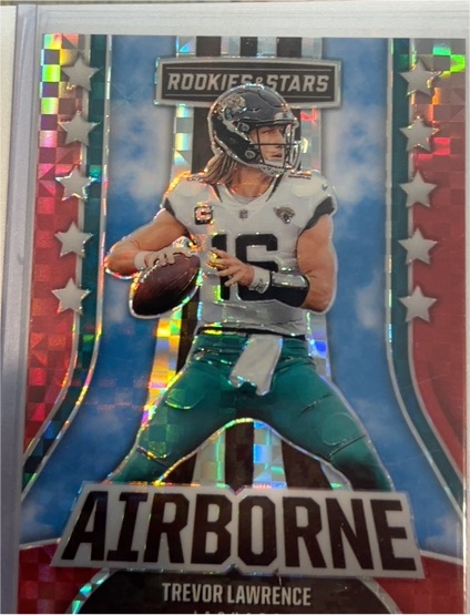 2023 Panini Rookies & Stars #AI-15 Trevor Lawrence Airborne Red Plaid — front