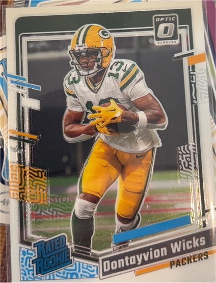 2023 Donruss Optic #249 Dontayvion Wicks — front