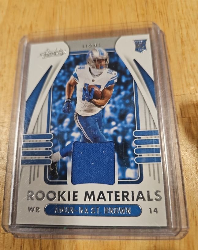 2021 Panini Absolute Rookie Materials #14 Amon-Ra St. Brown — front