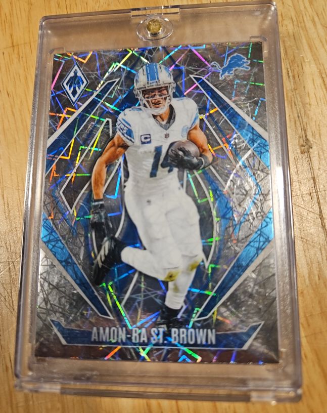 2024 Panini Phoenix #8 Amon-Ra St. Brown — front