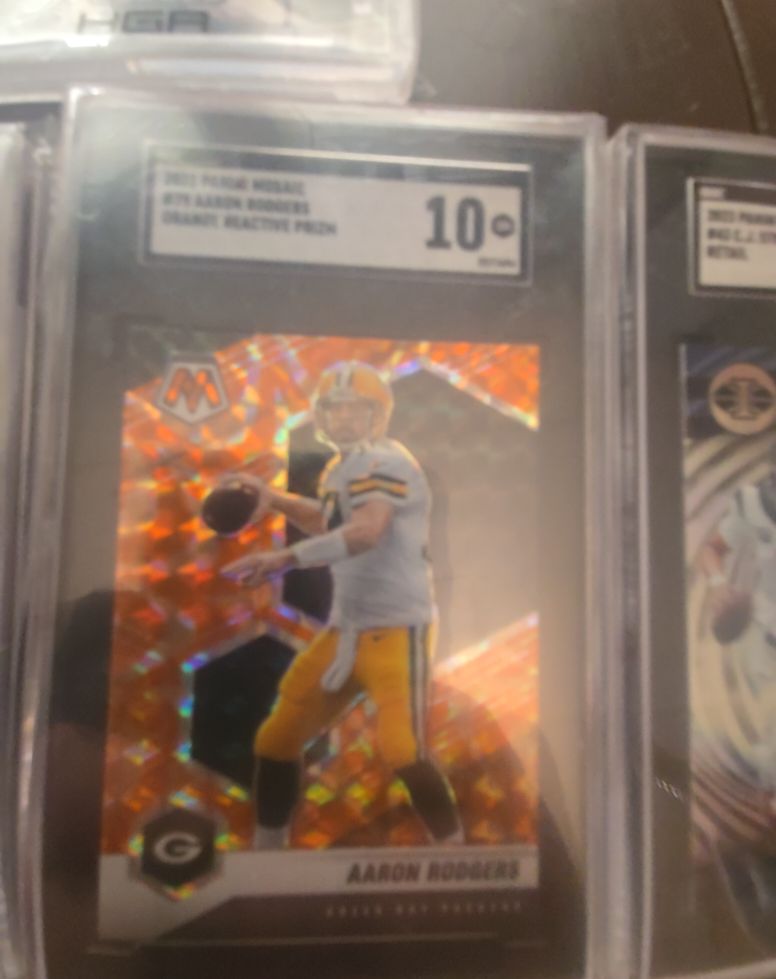 2023 Panini Mosaic #75 Aaron Rodgers Orange Reactive Prizm — front