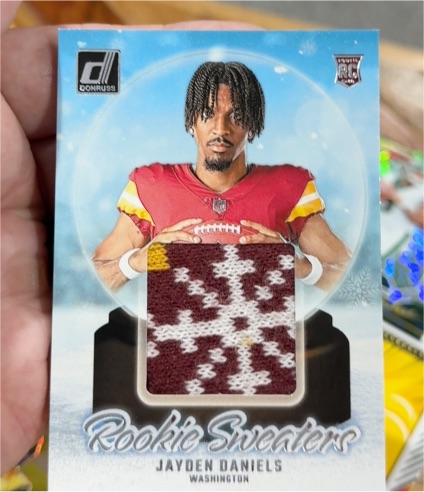 2024 Panini Donruss Rookie Holiday Sweaters #RHS-JDA Jayden Daniels — front