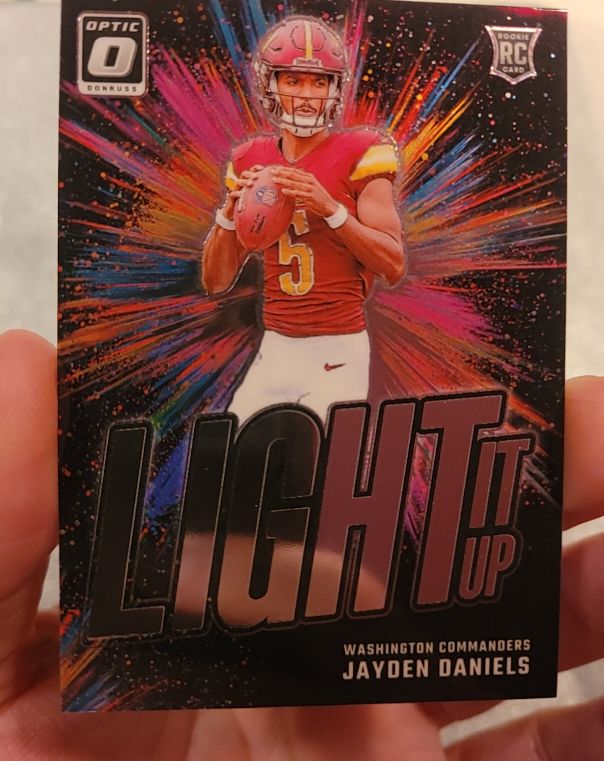 2024 Donruss Optic #8 Jayden Daniels Light It Up Rookie Insert — front