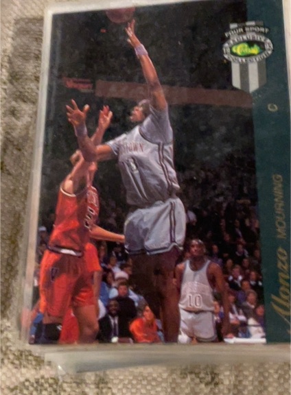 1991 NBA Hoops Action Photos #AP-1 Alonzo Mourning — front