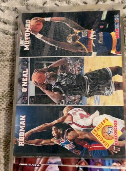 1993-94 Hoops #284 Rebounds (Dennis Rodman / Shaquille O'Neal / Dikembe Mutombo) — front