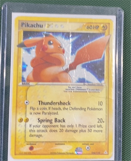 2006 Pokemon EX Holon Phantoms #104 Pikachu Gold Star — front