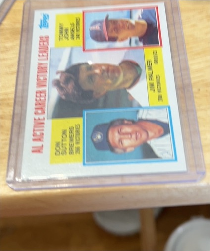 1984 Topps #715 AL Active Career Victory Leaders Jim Palmer/Don Sutton/Tommy John — front