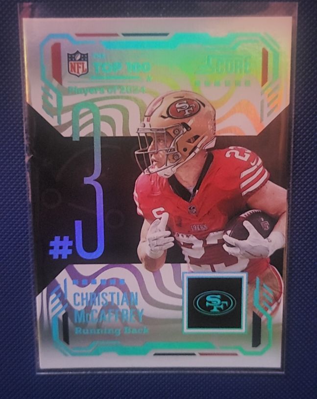 2025 Panini Score Top 100 #3 Christian McCaffrey — front