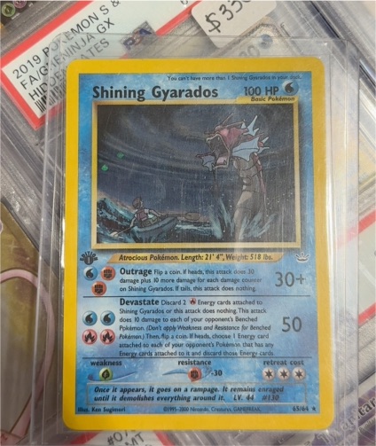 2001 Pokémon Neo Revelation #65 Shining Gyarados — front