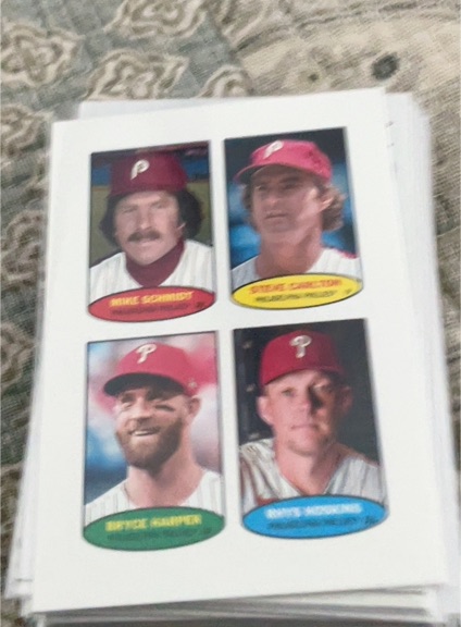 2023 Topps Heritage 1974 Topps Baseball Stamps #74BS-29-32 Mike Schmidt, Steve Carlton, Bryce Harper, Rhys Hoskins — front