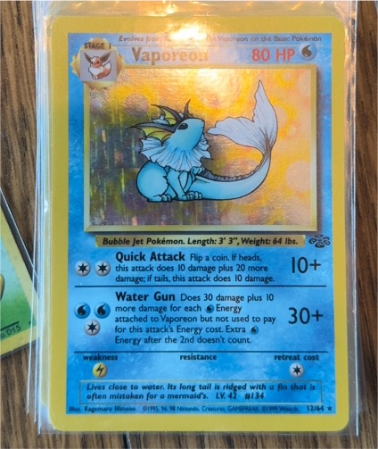 1999 Pokémon Jungle #12 Vaporeon Holo — front