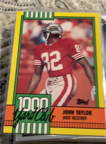 1990 Topps #24 John Taylor 1000 Yard Club — front
