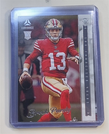 2022 Panini Chronicles Luminance #213 Brock Purdy — front