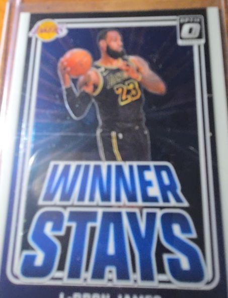 2024-25 Panini Donruss Optic #1 LeBron James Winner Stays — front