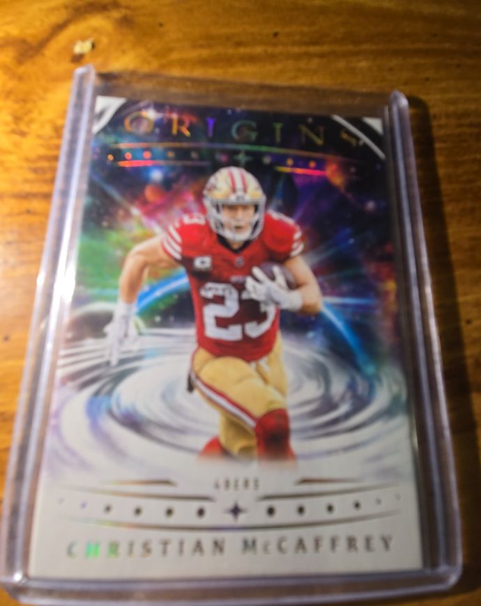 2025 Panini Origins #85 Christian McCaffrey — front