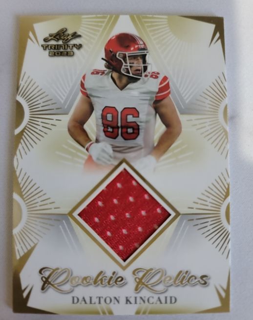 2023 Leaf Trinity #RR-10 Dalton Kincaid Rookie Relic Gold — front