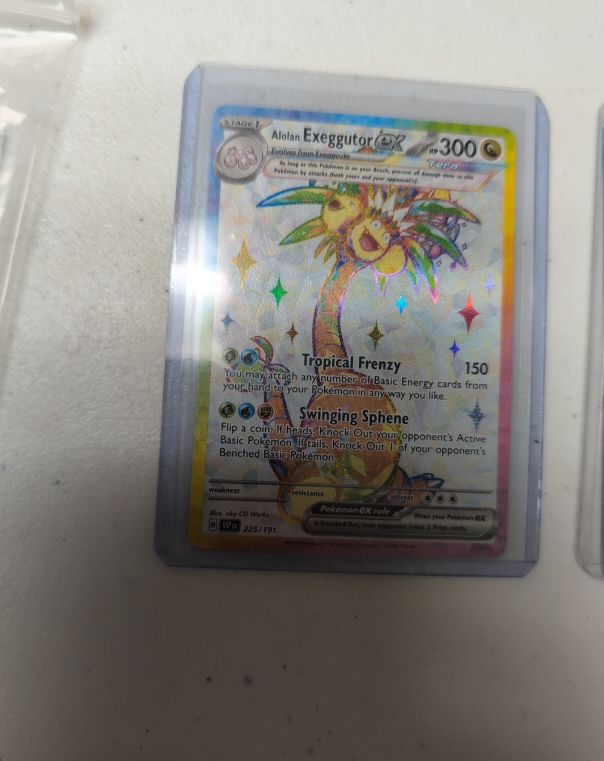 2024 Pokémon TCG Surging Sparks #225 Alolan Exeggutor GX — front