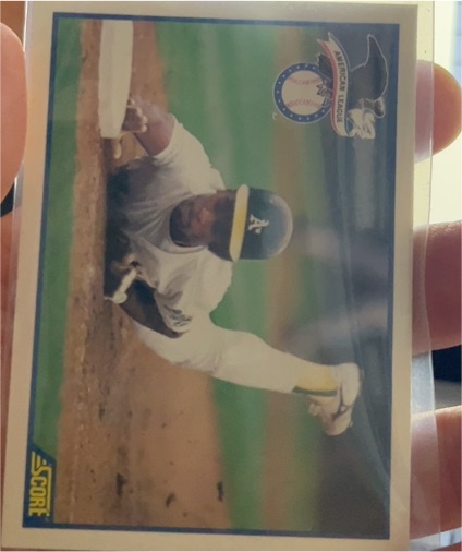 1990 Score #698 Rickey Henderson — front