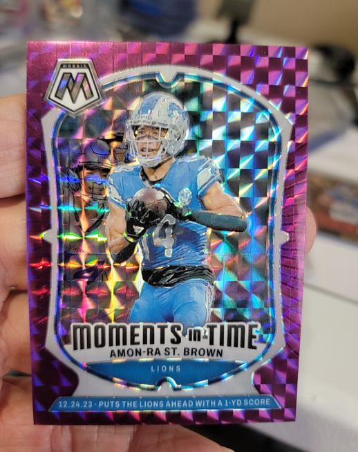 2024 Panini Mosaic #24 Amon-Ra St. Brown Moments In Time — front