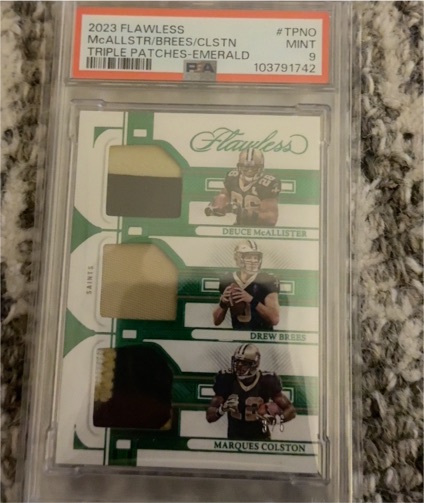 2023 Panini Flawless Triple Patches Emerald #TPNO Deuce McAllister/Drew Brees/Marques Colston — front