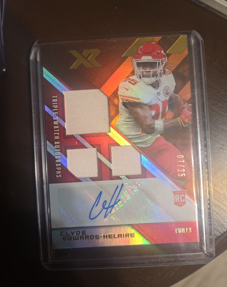 2020 Panini XR # not visible Clyde Edwards-Helaire Rookie Triple Swatch Autographs — front