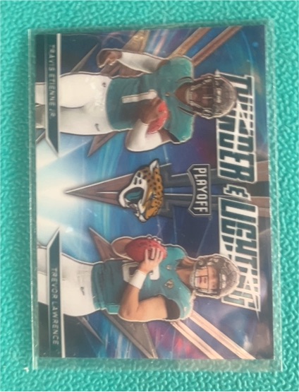 2021 Panini Playoff Thunder & Lightning #TL-17 Trevor Lawrence & Travis Etienne Jr. — front