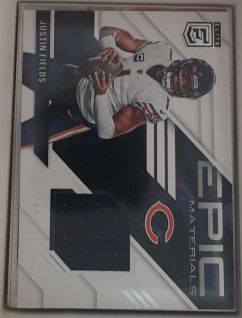 2023 Panini Elite Epic Materials #1 Justin Fields — front
