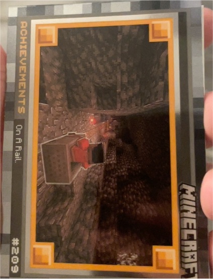 2024 Panini Minecraft Achievements #209 On a Rail — front