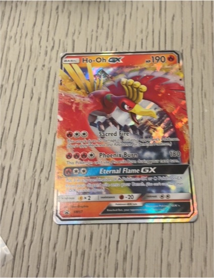 2017 Pokemon TCG Ho-Oh GX SM57 Black Star Promo — front