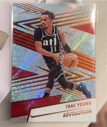2024-25 Panini Revolution #27 Trae Young — front