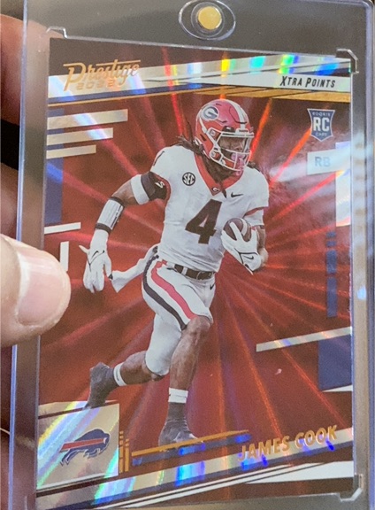 2022 Panini Prestige #347 James Cook Xtra Points Sunburst — front