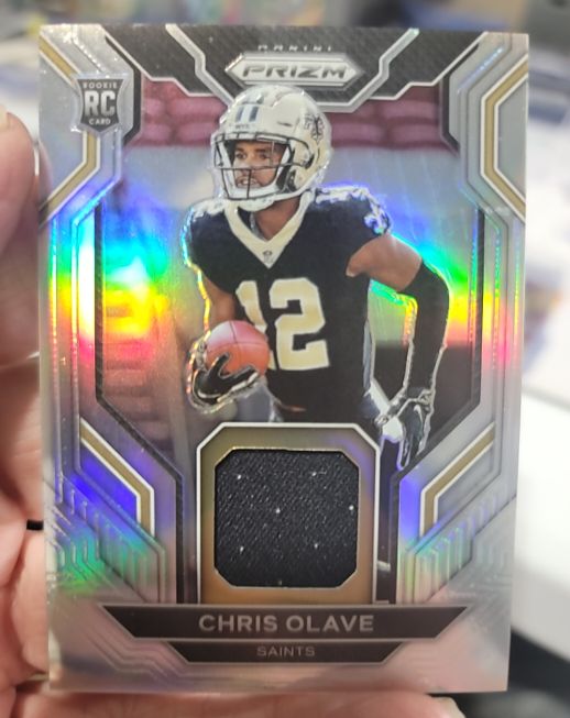 2022 Panini Prizm #RG-CO Chris Olave Rookie Gear Silver Prizm — front