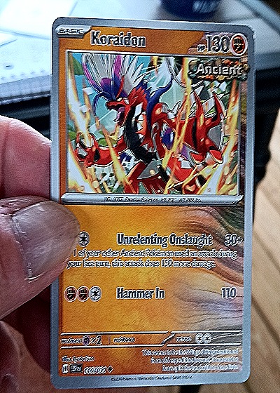 2024 Pokémon Scarlet & Violet Surging Sparks #116 Koraidon — front