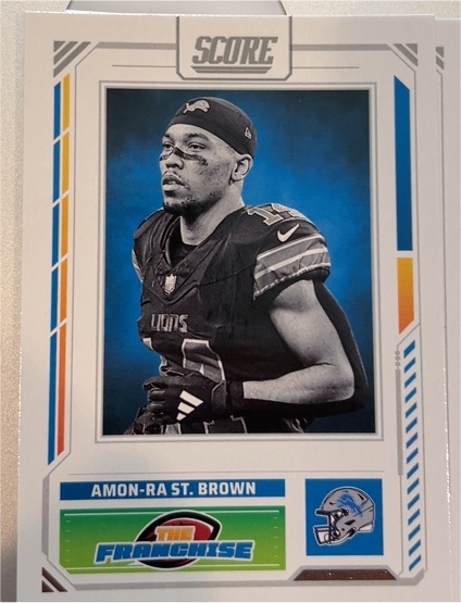 2025 Panini Score #11 Amon-Ra St. Brown The Franchise — front