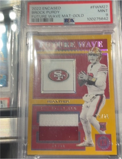 2022 Panini Encased #FWM-27 Brock Purdy Future Wave Mat-Gold — front