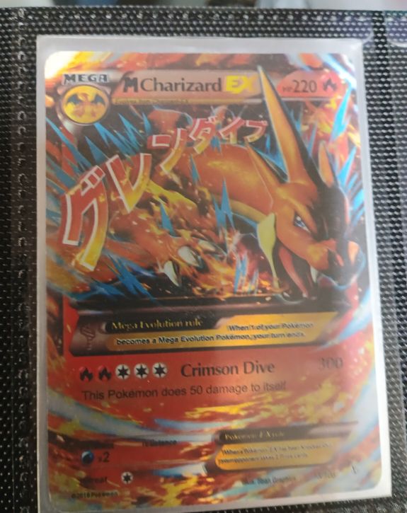 2014 Pokémon XY Flashfire #13/106 Mega Charizard EX — front