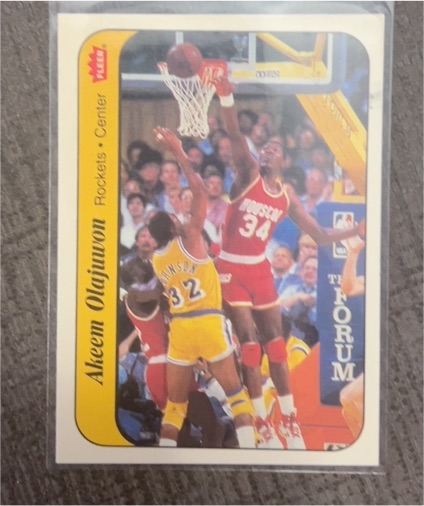 1986 Fleer Sticker #9 Akeem Olajuwon — front