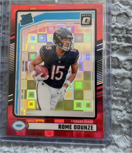 2024 Donruss Optic #309 Rome Odunze Rated Rookie Optic Preview Red Pandora Prizm — front
