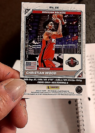 2021-22 Panini Sticker & Card Collection #54 Christian Wood — back