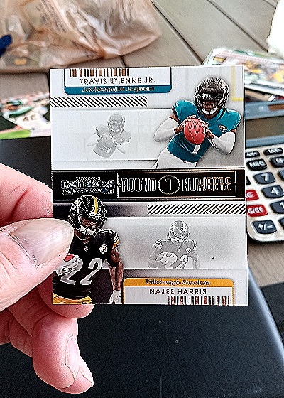 2021 Panini Contenders Round Numbers #RN-TET Travis Etienne Jr. Najee Harris — front