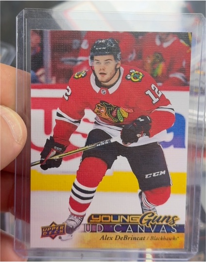 2017-18 Upper Deck UD Canvas Young Guns #C114 Alex DeBrincat — front