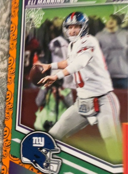 2025 Panini Score-A-Treat #78 Eli Manning — front