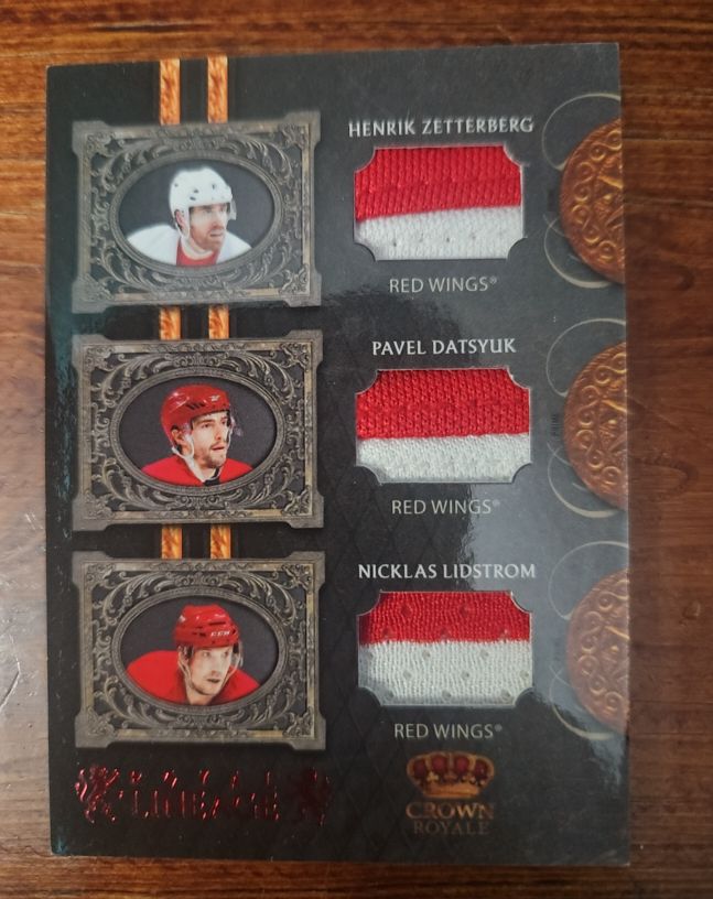 2010-11 Panini Crown Royale Royal Lineage Triple Jersey Henrik Zetterberg/Pavel Datsyuk/Nicklas Lidstrom — front