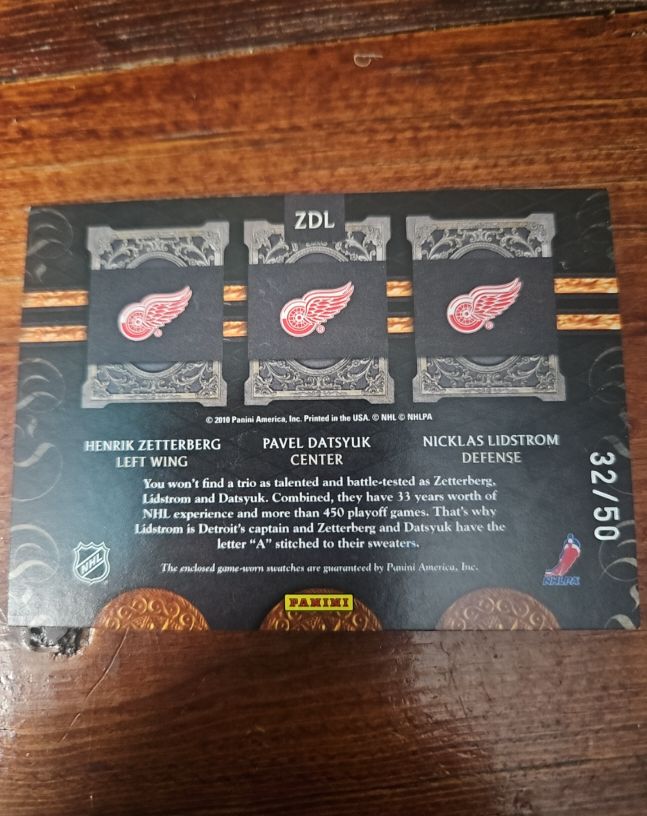2010 Panini Crown Royale Royal Lineage ZDL Henrik Zetterberg Pavel Datsyuk Nicklas Lidstrom — front