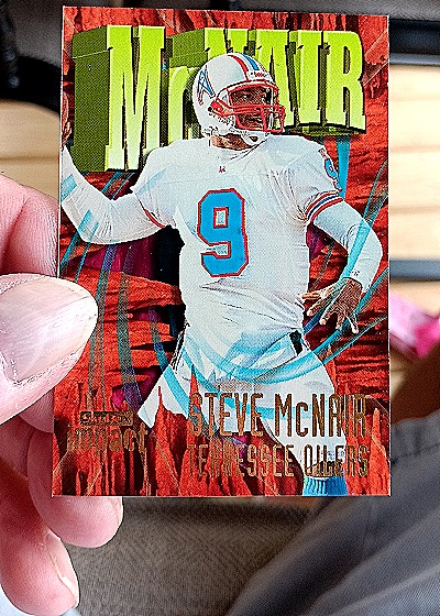 1997 SkyBox Impact #9 Steve McNair — front