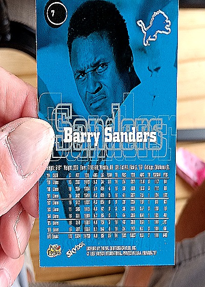 1997 SkyBox Premium #7 Barry Sanders — back
