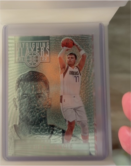 2021-22 Panini Illusions Intriguing Players Emerald #21 Nikola Jokić — front