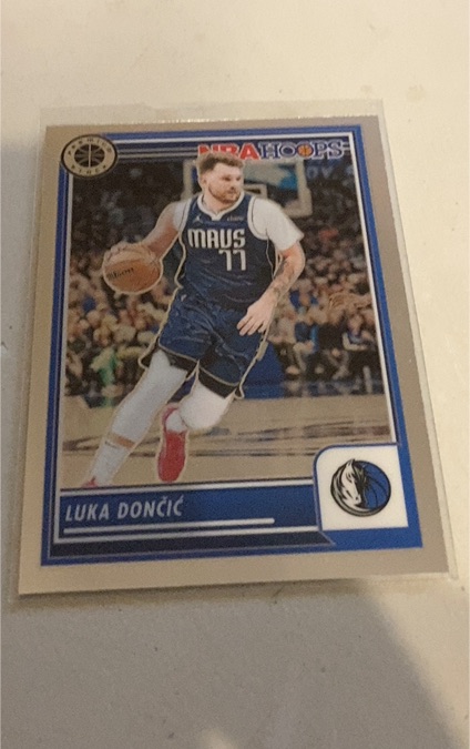 2023-24 Panini NBA Hoops Premium Stock #9 Luka Doncic — front