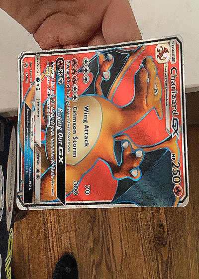 2017 Pokémon SM Black Star Promo #SM60 Charizard GX — front